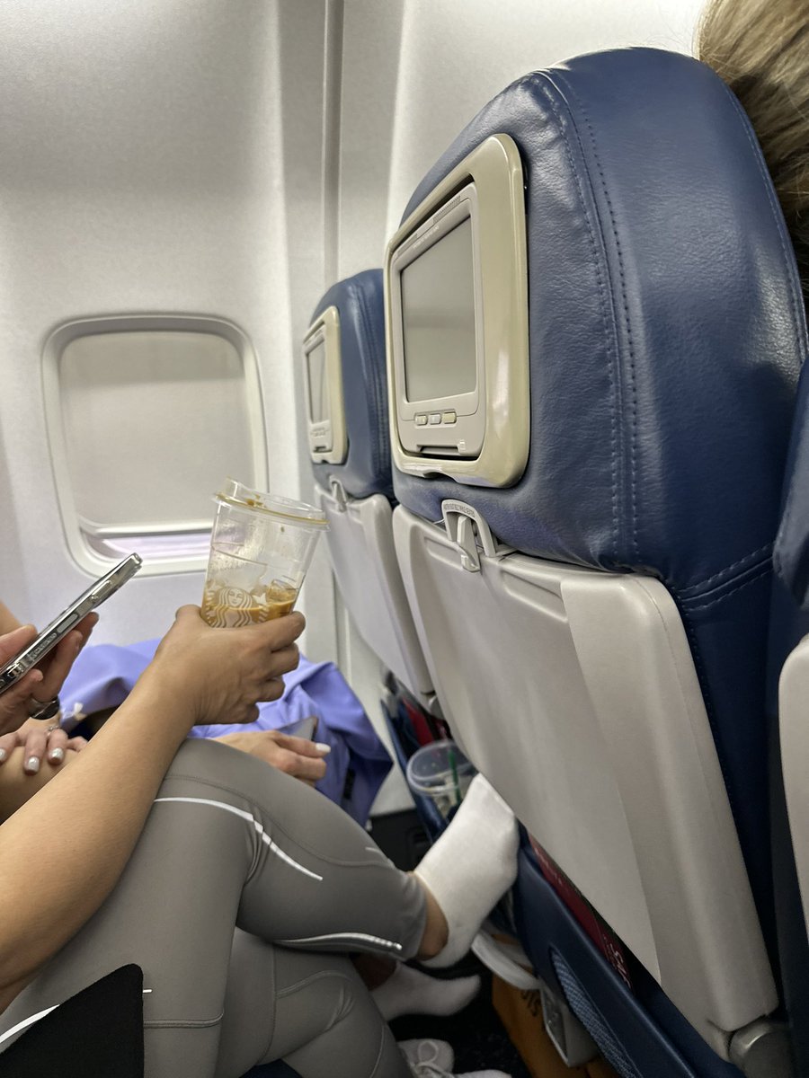 Kaithlin_F's tweet photo. Not to be dramatic, but… Why is it okay to have your shoes off on a flight? https://t.co/SYdRpNVCvV