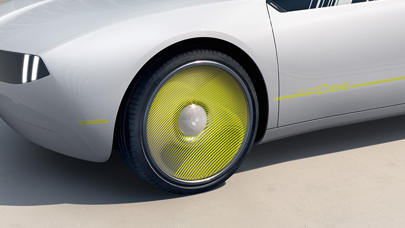 designboom's tweet photo. debuting in full-color at CES 2023, the @BMW i vision dee concept electric car can change tone in seconds using E Ink technology https://t.co/TD13MqA9mr https://t.co/aHxVOw4adk