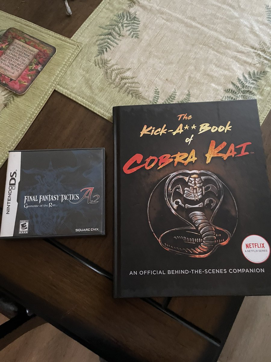 prettymegs_s's tweet image. Got these two in the mail today. My hubby and I love Cobra Kai so this book was a must. Plus I wanted to get play my DS more so this is an excuse to play it. #CobraKai #FinalFantasyTacticsA2 #NintendoDS