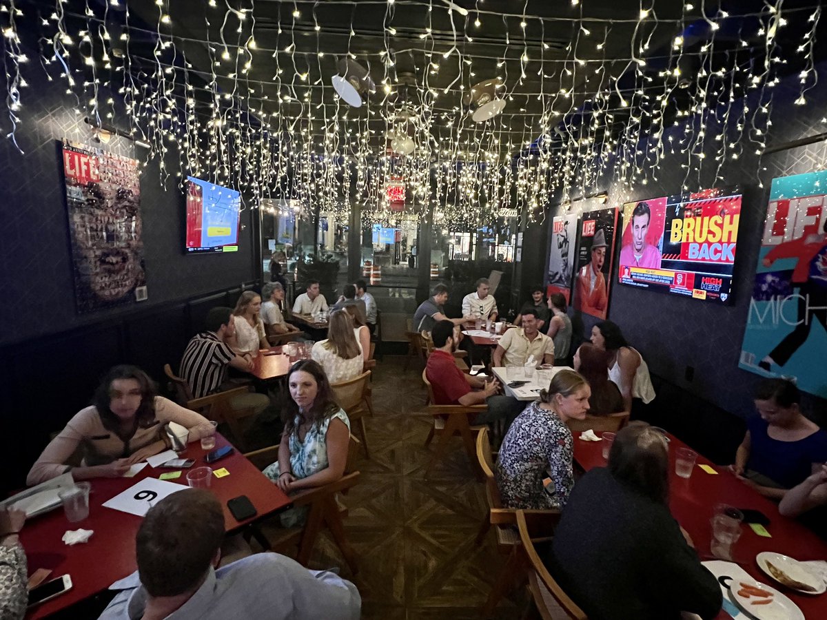 DavidsonCareers's tweet photo. We have enjoyed getting back on the road with our men’s and women’s swimming &amp; diving teams as they train in Fort Lauderdale, FL. 

Tuesday night we conducted a networking and interview competition at American Social to prepare our scholar-athletes for their futures. https://t.co/WeDNfxtmaF