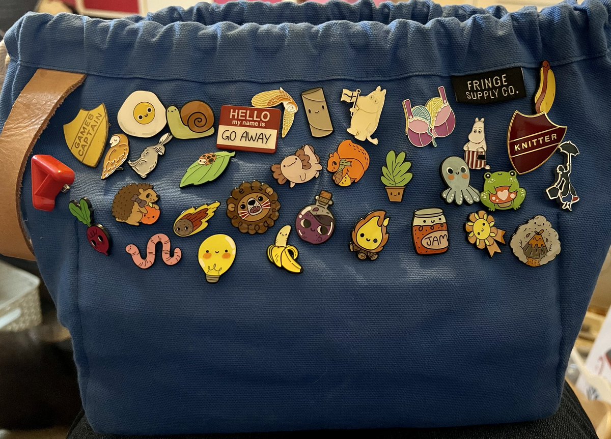I’m going to need a bigger knitting bag at  this rate. My mostly <a href="/doodlesbyben/">doodlesbyben</a> <a href="/ben_cameron/">Ben Cameron</a> pin badge collection featuring new favourites the worm and the banana!
