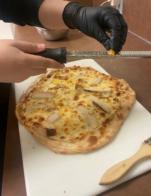 PISDCareerTech's tweet photo. Culinary students from Pasadena Memorial High School cooking up delicious pizza and pasta to go from way back in 2022. Can't wait to see/taste what's cooking in 2023. #PISDCTE #CTE #CTEAllStars #culinaryarts #culinary #flavortown #pizzafromscratch #pastafromscratch https://t.co/JWK1RI5eLJ