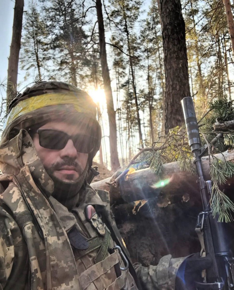 DefenceU's tweet photo. Ihor Mitrov, Ukrainian poet and literary critic. Today he is a serviceman of the #UAarmy.
Ihor was born in Kerch, Crimea. 
Our poets are fighting against convicts and washing machine thieves. 
Our poets will win. 
Ukraine will win. https://t.co/p3qIhxDrwQ