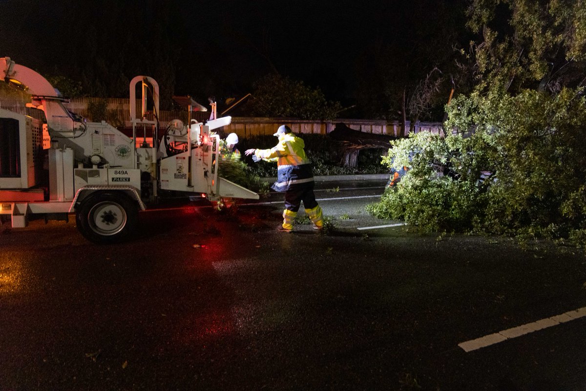 pleasantonpd's tweet photo. Talk about weathering the storm together. ☔️ Joined by our friends from @pleasantonca, LPFD, and PG&amp;E, our members responded to downed trees, power lines, and other overnight hazards. Thankfully, there were no reported injuries. https://t.co/y1iOCziJ0E