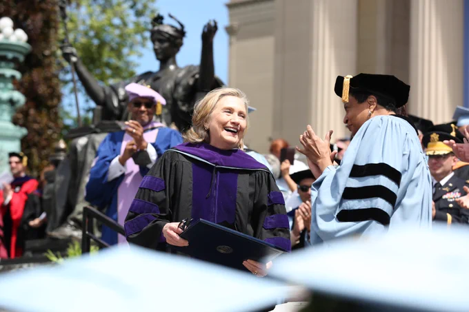 Hillary Rodham Clinton receives an honorary degree at Columbia University's 2022 Commencement on steps of Low Memorial building.