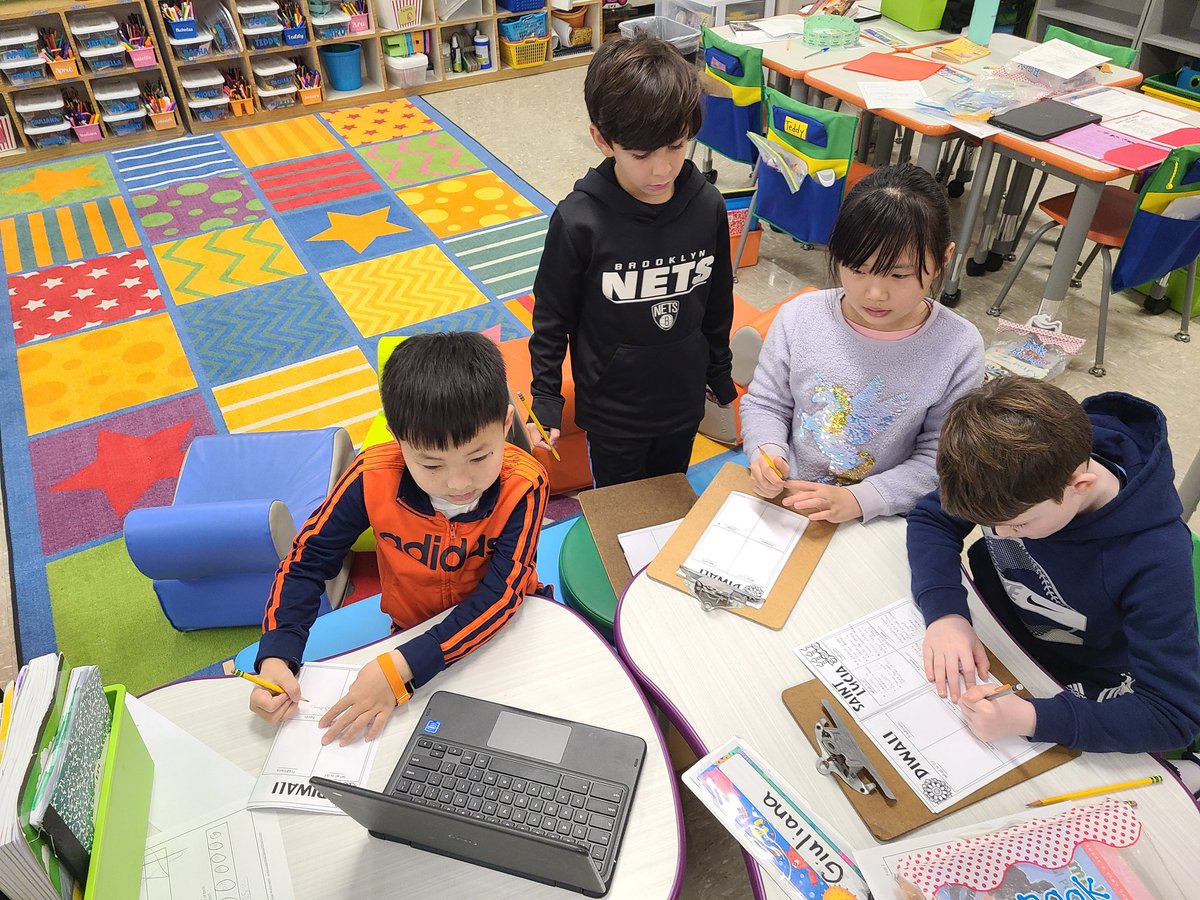 mmhteach's tweet photo. #class3h uses the jigsaw strategy in groups to tackle note-taking with peers! Each group is recording facts about different parts of Diwali!! @JRRS_Jericho #jrrsfamily https://t.co/9EeJtstwvv