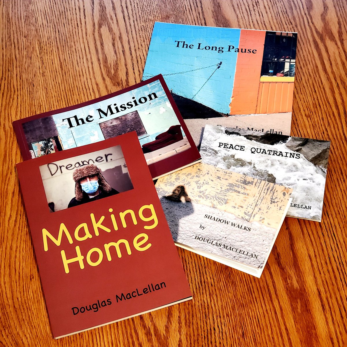 dougmaclellan's tweet photo. There you go, my COVID-19 publications. Five books. Two books on #homelessness published by @READBLACKMOSS Press. One self published @BlurbBooks. Two handmade including one with Jeff Noonan. #MakingHomeBook #TheLongPause #PeaceQuatrains #TheMission #ShadowWalks #PublishOrPerish https://t.co/Ozq8lQWh5f