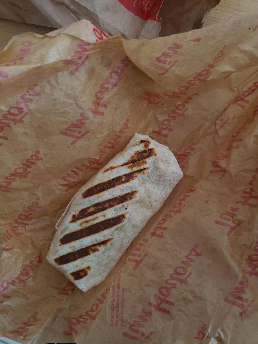 Scribbles1303's tweet photo. What's up @TimHortons is this how the farmers wrap comes now? This is like a 2 bite burrito? #timhortons #burrito #farmerswrap #2bite #notallsmallthingsaregood #wrapgate #wheresmyfood #hungry #breakfast https://t.co/rPE951UquG