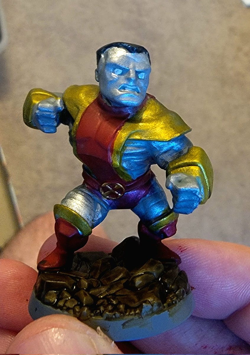 Painted Marvel United Colossus.  Day 11 of trying for a model finished every day.  Painted by Ben Tuite 01/05/2023.  #TabletopGames #TabletopPainting #BoardGames #BoardGamePainting #SlapChop #MiniatureGames #MiniatureGaming #Marvel #BenTuite #XMen #Colossus #MarvelUnited