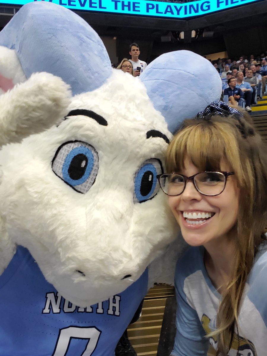 Thenancyrayguns's tweet photo. It's been decades since I've seen my Heels play in Chapel Hill. I had a BLAST acting up in the probably-when-I'm-not-there mellow section. I 💙 Mood Coordinator @BDAHT &amp; I got quality jumbotron time! The Heels showed up, showed out, showing the Deacs the door #uncbball #gdtbath🐏 https://t.co/BUsySaiLcy