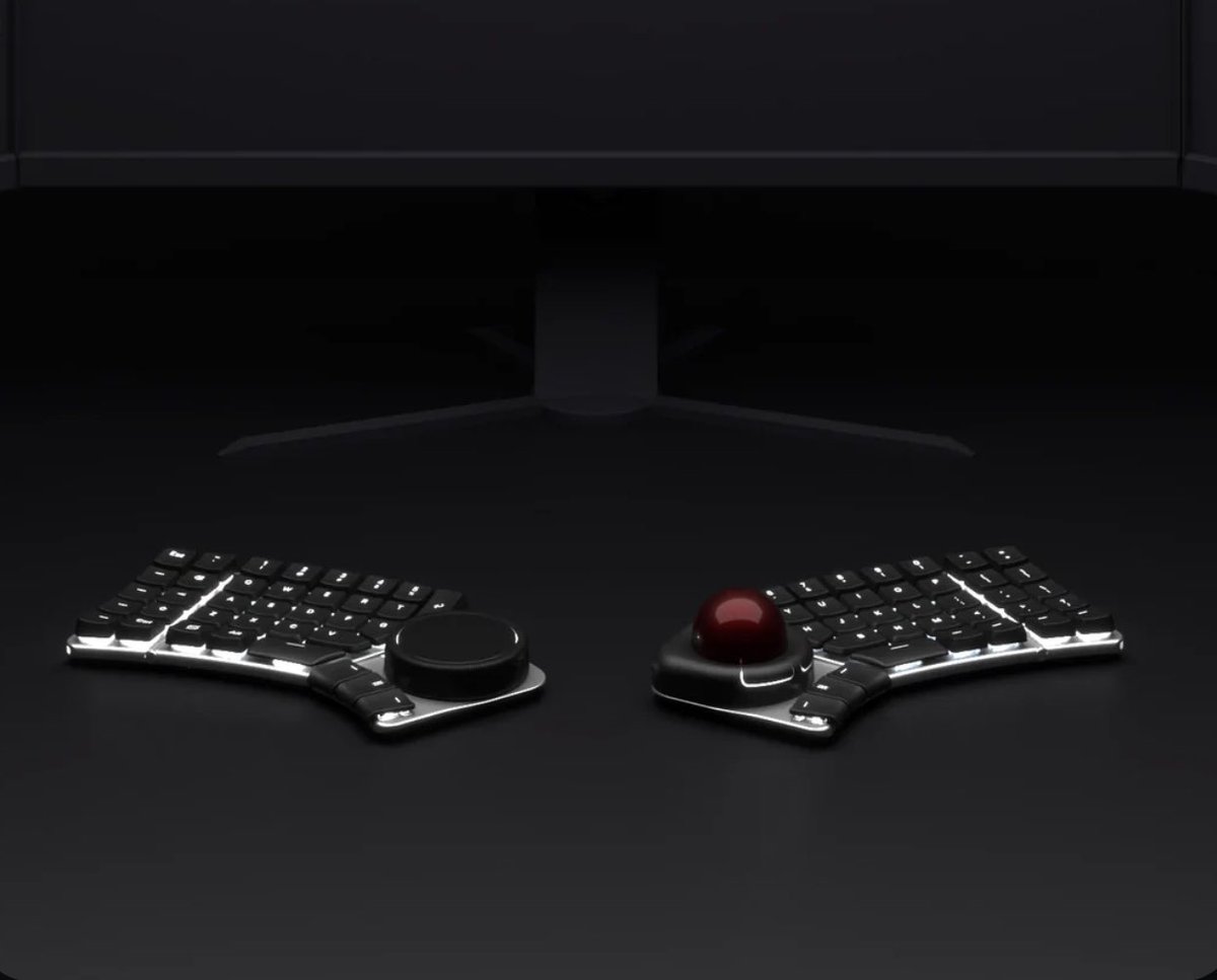 d_kamiichi's tweet photo. 開催中の｢CES 2023｣で凄いエルゴノミクス・キーボードが出展されてる......。

モジュール型で①トラックボール②マウスパッド③3Dナビ④ダイヤルから選択。

テンティングできてBluetooth接続＆ワイヤレス充電。ホットスワップ可能。RGBライトあり。ロープロも選べる。

https://t.co/2vTCZqQgBo https://t.co/fqiJ0YrsaS