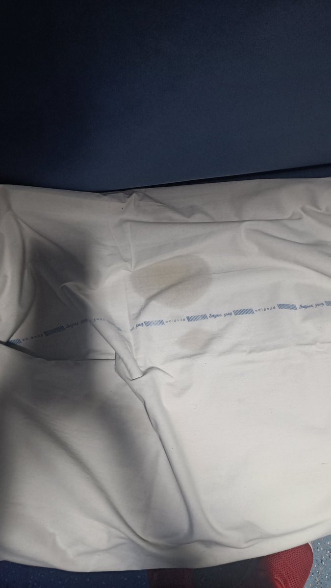 Vivek03Gupta's tweet photo. Travelling in train 15065 nd m surprised to see the conditions of bed rolls provided in 2nd AC. does this look like a cleaned sheet. what action would you take on this @RailMinIndia @DrmJhansi @AshwiniVaishnaw @RailwaySeva https://t.co/wM8mVDiNMw