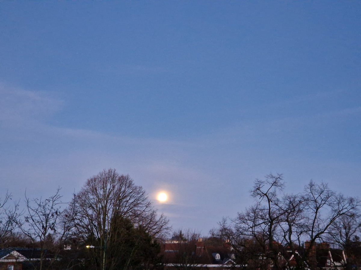 The moon bright and still high in the sky on my walk in to work this morning 😴
