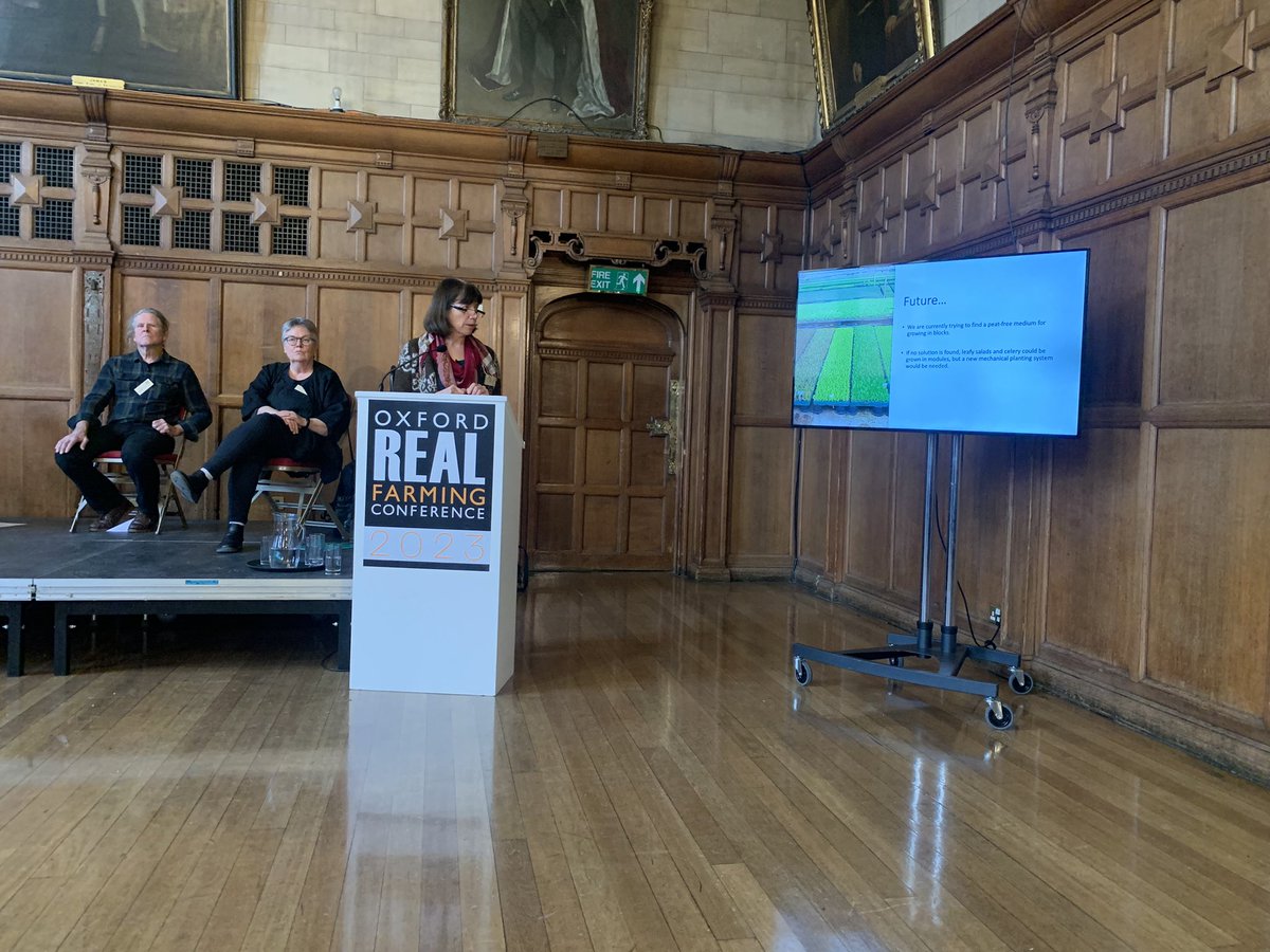 IFarmers's tweet photo. Jill Vaughn (Delfland Nurseries) explains challenge of planting modules grown in #peatfree medium using a mechanical planter - will either need to change way of planting modules or produce a viable non-blocking peat-free alternative #ORFC23 https://t.co/idDZ8TosGj