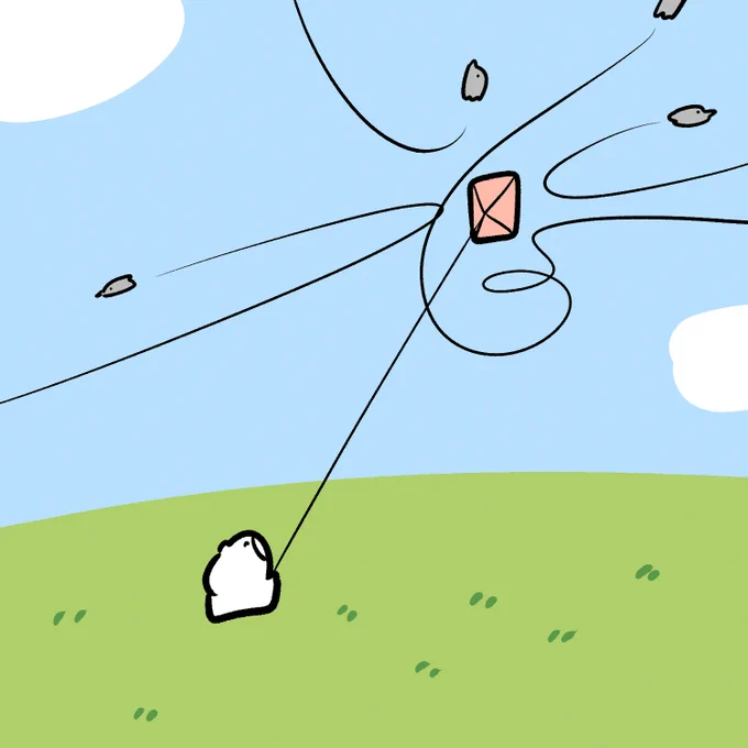 凧に あおり飛行する鳥 
