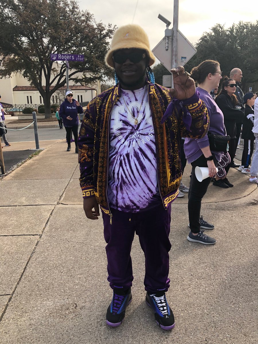 t_myah's tweet photo. Horned Frog fans are lining West Cantey Street on TCU’s campus to send the football team off to the national championship game on Monday in LA.

Lots of excitement and a whole lot of purple. Fans are telling me how pumped they are that TCU is on the map. #GoFrogs #NattyFrogs https://t.co/8oTaCCfj1q