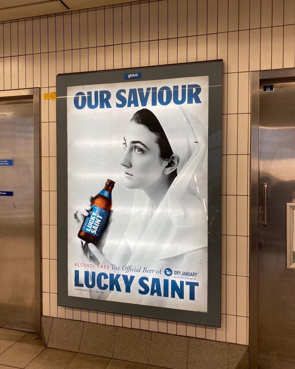 LuckySaintBeer's tweet photo. Have you spotted us on the tube yet? 📸 Find us on digital and print screens nationwide, and be sure to share your pictures with us by tagging @LuckySaintBeer 

Thou shalt not, not drink this Dry January.

#DryJanuary #luckysaint #alcoholfree https://t.co/R06pHWZjtd