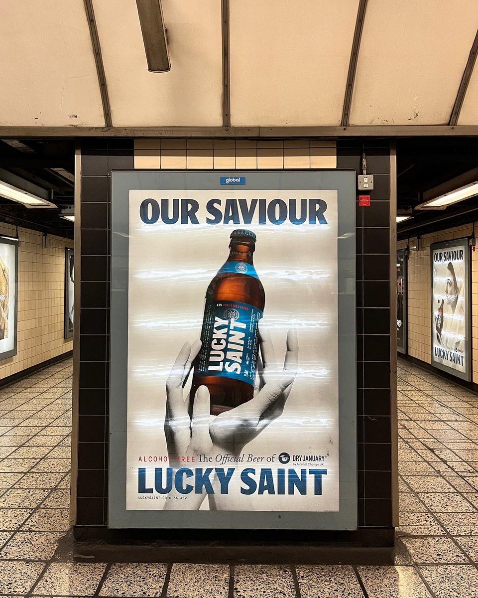 LuckySaintBeer's tweet photo. Have you spotted us on the tube yet? 📸 Find us on digital and print screens nationwide, and be sure to share your pictures with us by tagging @LuckySaintBeer 

Thou shalt not, not drink this Dry January.

#DryJanuary #luckysaint #alcoholfree https://t.co/R06pHWZjtd
