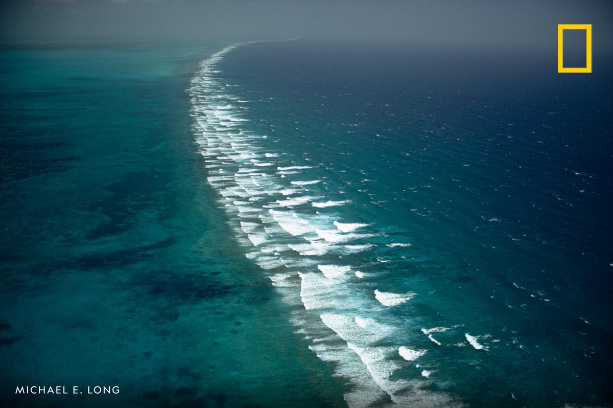 NatGeoPhotos's tweet image. The surf's eternal thunder booms against Belize's barrier reef.
