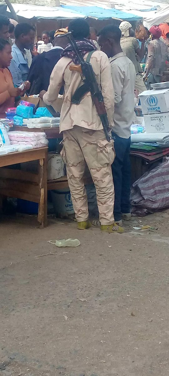 GualJeganu's tweet photo. Shire. Today. How many Tigrayans did this terrorist from Eritrea kill? And yet he walks freely in the Shire marketplace. They threaten and intimidate locals, especially women. #FreeTigray https://t.co/7OHFyVef4s