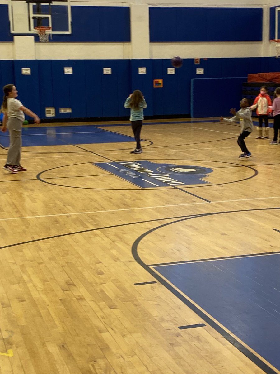 VO 3rd graders participating in various stations in PE class.