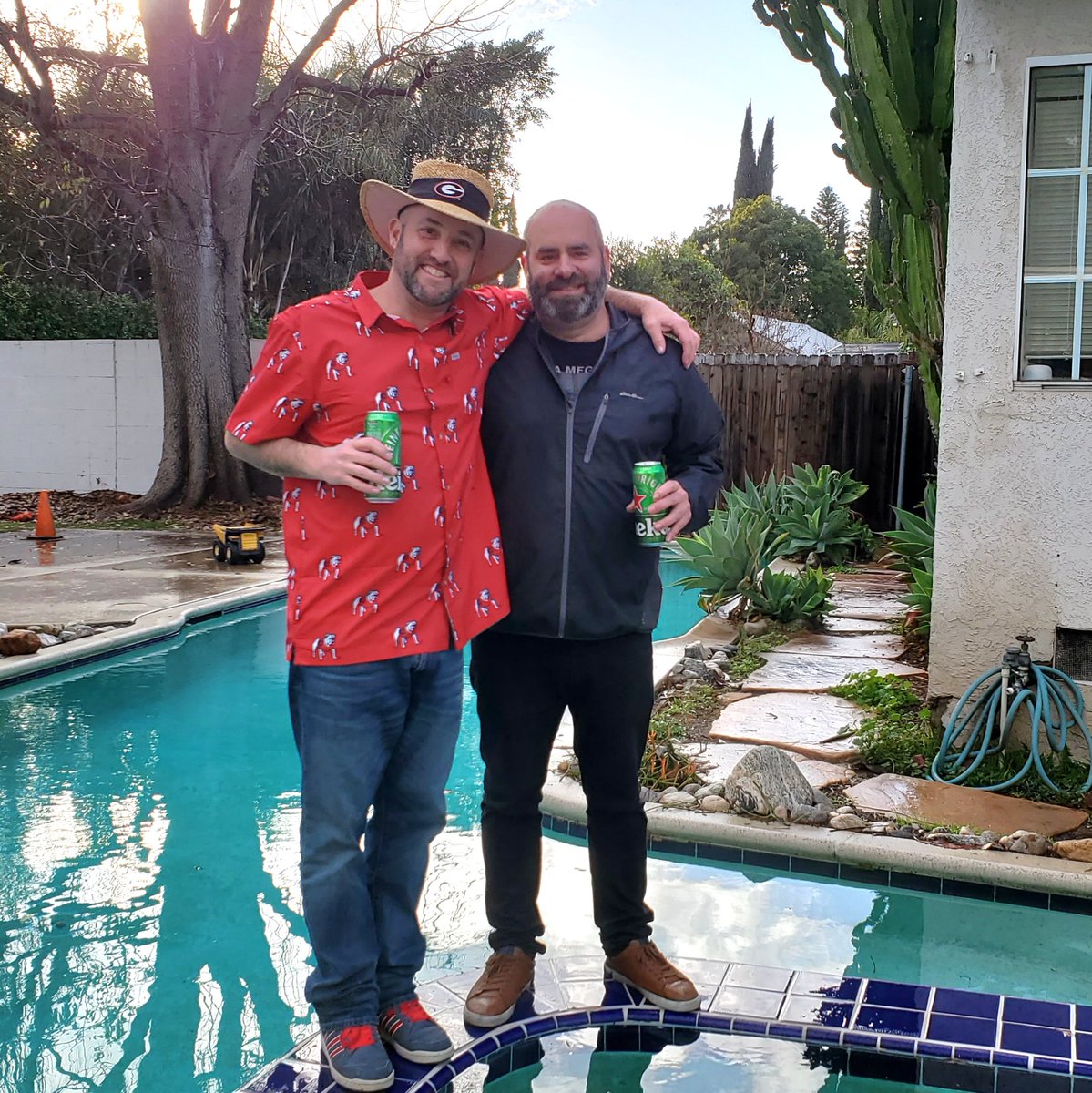 WorkaholicHouse's tweet photo. Georgia in Da House! Superfan Steve stopped by The Workaholics House to take a lucky cannonball into the pool before the big game🏈 #GeorgiaBulldogs #CFPNationalChampionship #FridayFeeling https://t.co/QP8hHMzTeE