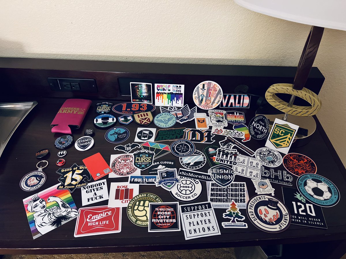 zlaka_84's tweet photo. SG Scarf / sticker / swag addiction is very real lol at @ISCSupporters conference! 13 scarves 50 stickers a few pins some patches a couple magnets a keychain and 4 beer koozies from all over the soccer landscape! ⚽️🧣🍺⚽️ #ISCABQ #ScarfWhore #ILoveSoccerSGSwag #StickersForDays https://t.co/6IVmXHIO54