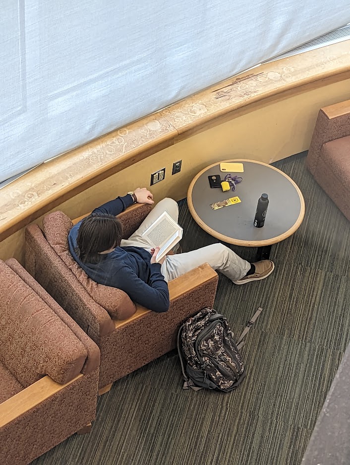 macphaidin_lib's tweet photo. We're happy to have students back and working in the library!  This student is getting some reading done on the 1st floor, north end.  Where's your favorite library workspace?

#MacphaidinLibrary #StonehillLibrary #StudySpaces #ReadingTime https://t.co/BM8x6RAnm2