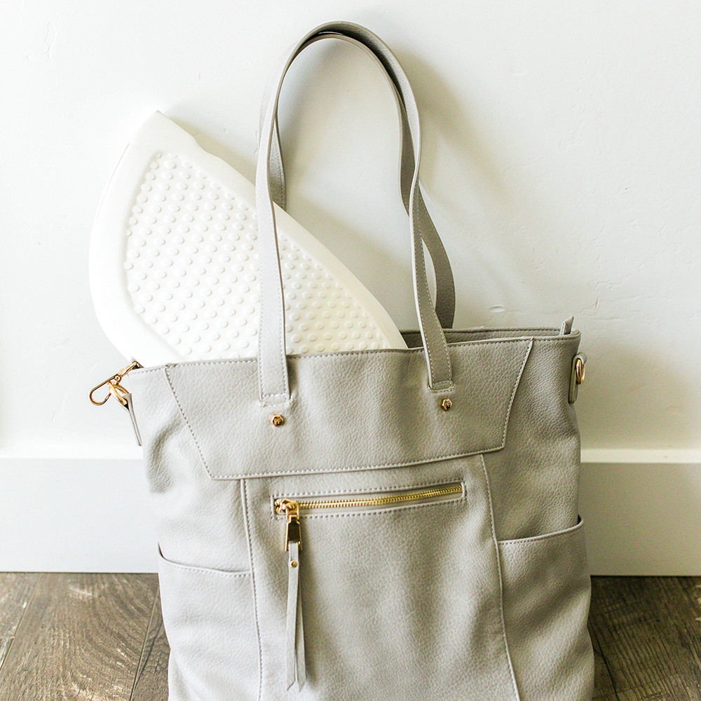 The Puj Flyte makes bath time easy at home, or on the go. Its compact shape allows it to fit in a suitcase, making it the perfect travel companion.