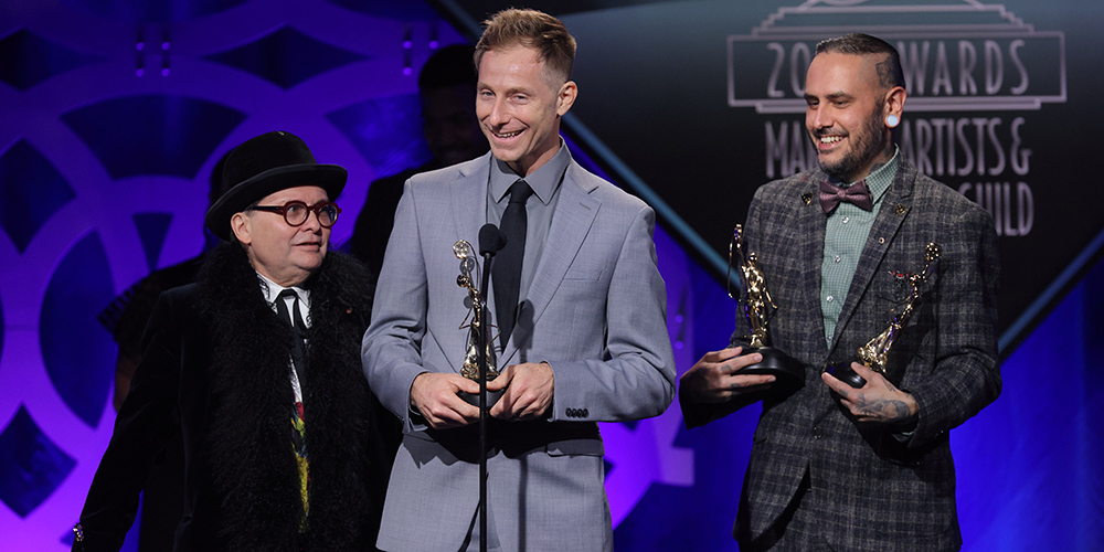 MUAHSawards's tweet photo. The 2022 Winners in the category of Best Contemporary Make-up in a Limited Miniseries or New Media Series - American Horror Stories! From left to right, Tyson Fountaine, Ron Pipes, and @GageMunster #MUAHSawards #local706 https://t.co/WEI53waxAo