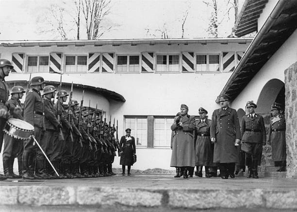 Hitler and Mussolini at the 'Berghof' near Berchtesgaden - Mussolini is greeted by an SS honour guard.