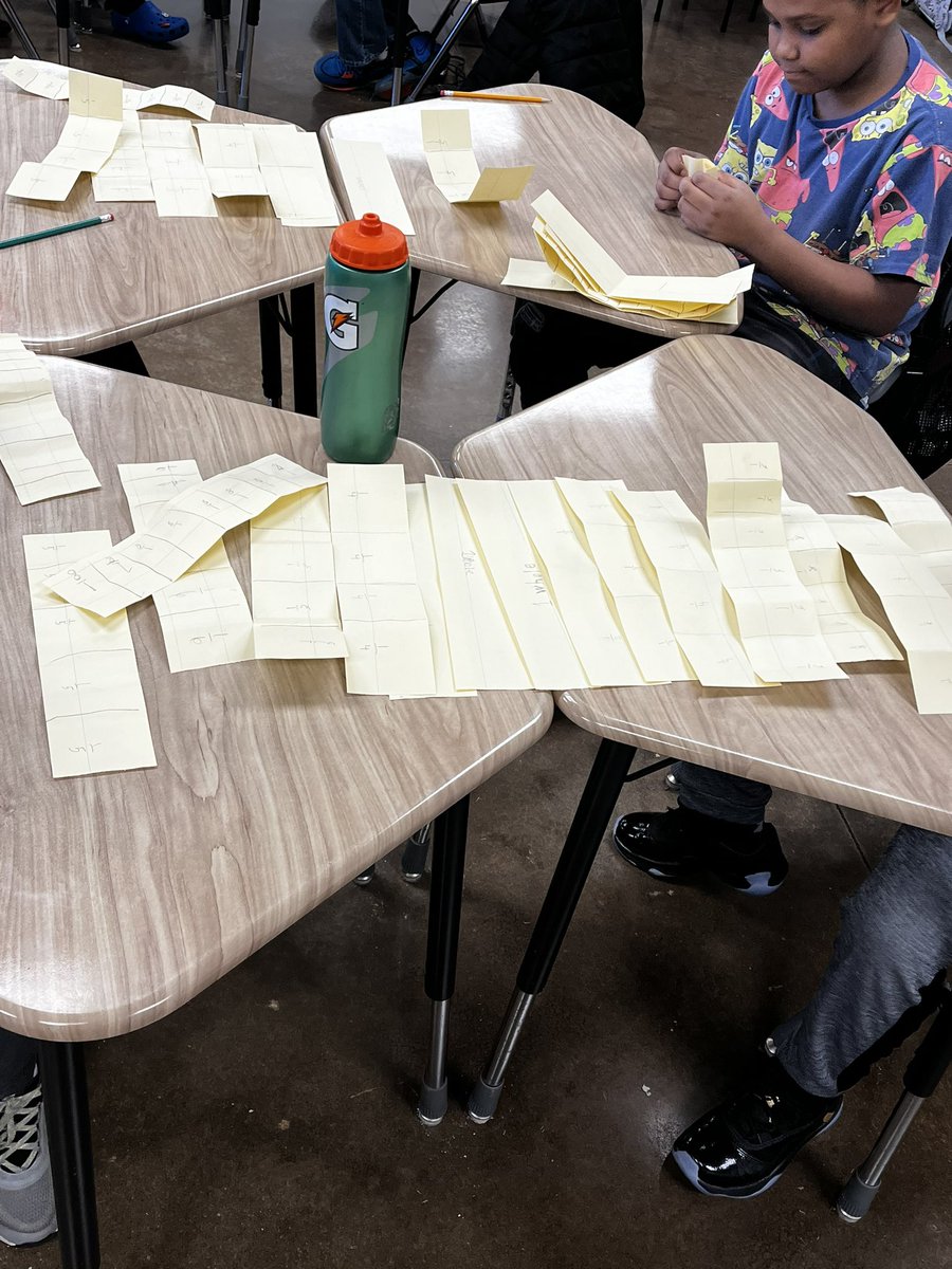 STownsendClass's tweet photo. @SycamoreElem started off the year last week creating fraction strips to generate equivalent fractions. The students thought @MindyMiller85 would be proud of us. @AMSTI_UM https://t.co/ro56t5Z0Zh