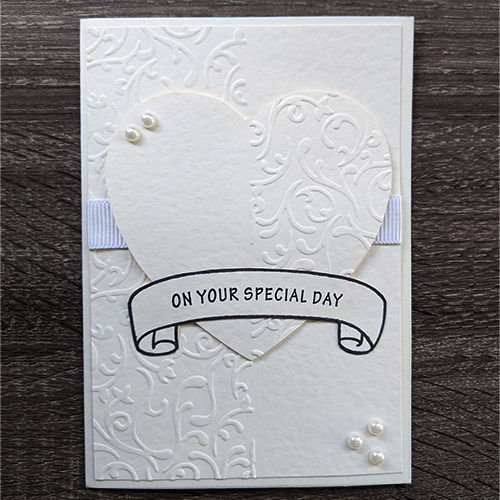 papermilldirect's tweet photo. Nicole used our Hammered Ivory card to create this gorgeous Wedding card. We love how she has alternated her embossed card on the heart and the backing card. 
📷 = Design Team member Nicole https://t.co/0wfHYBXtZD