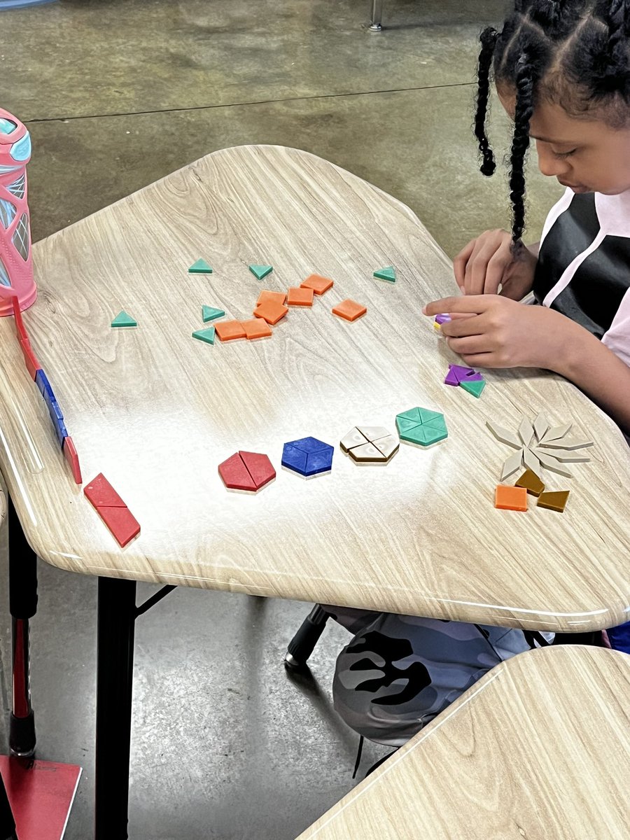 STownsendClass's tweet image. Pattern Blocks are the way to go when you need to find a whole. The fourth grade @SycamoreElem are rocking it out with manipulatives.  @AMSTI_UM