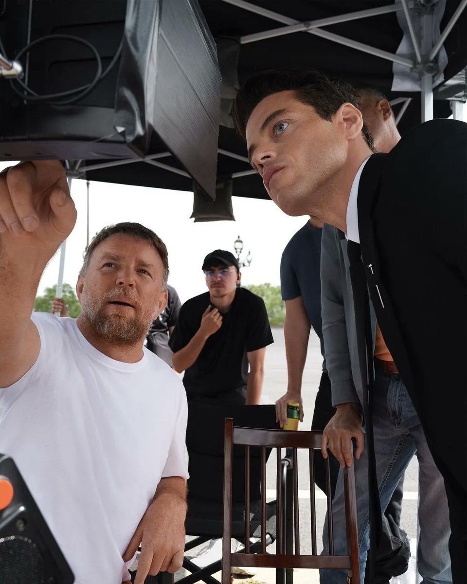 RamiMalekYeah's tweet photo. Rami Malek and director Guy Ritchie for Cartier https://t.co/wnnuKUIWLK