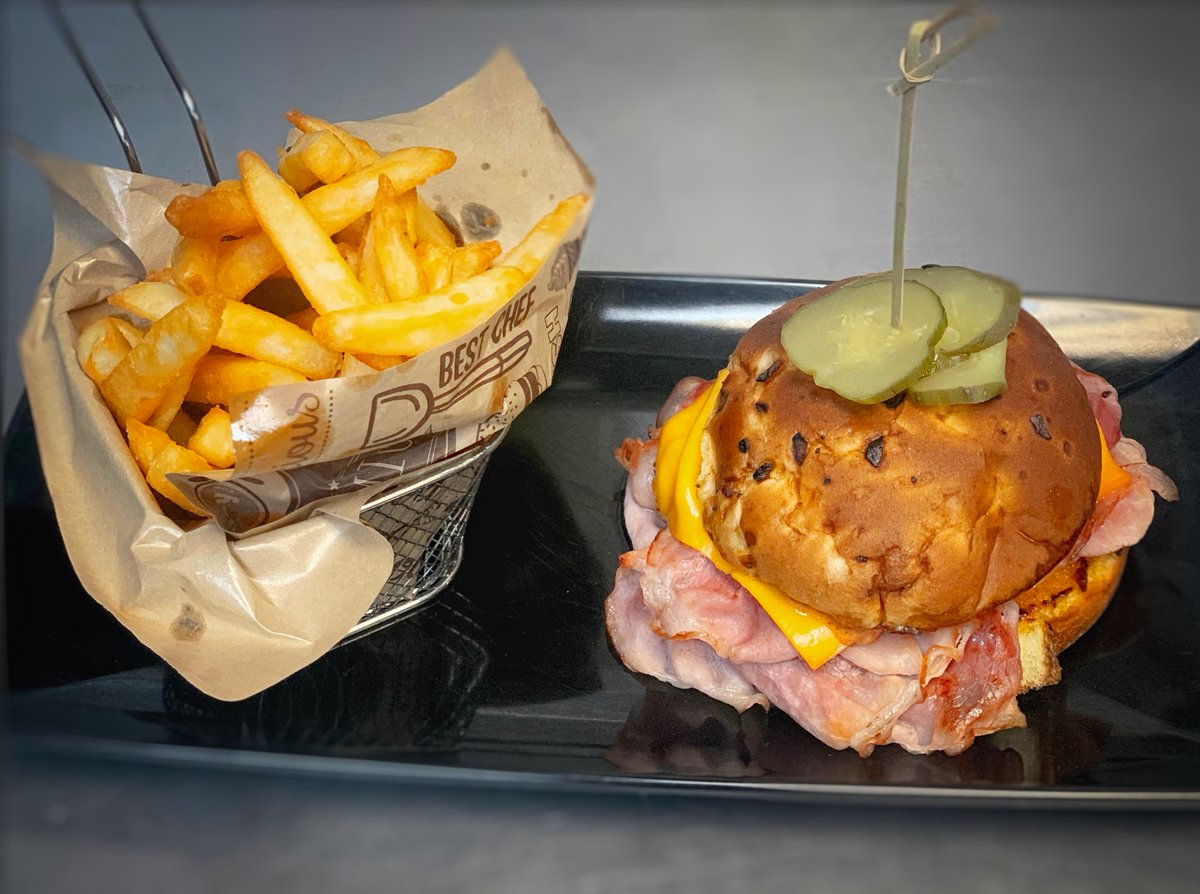 Sliced smoked ham, smoked cheddar cheese topped with a generous coating of Ever Sauce on a toasted Onion Bun. Served with Fries. Ever Sauce description - Blue cheese, Ranch, BBQ, with seasonings. #blarneystonepub #bspub #hamandcheese #berkelymichigan #royaloakmichigan