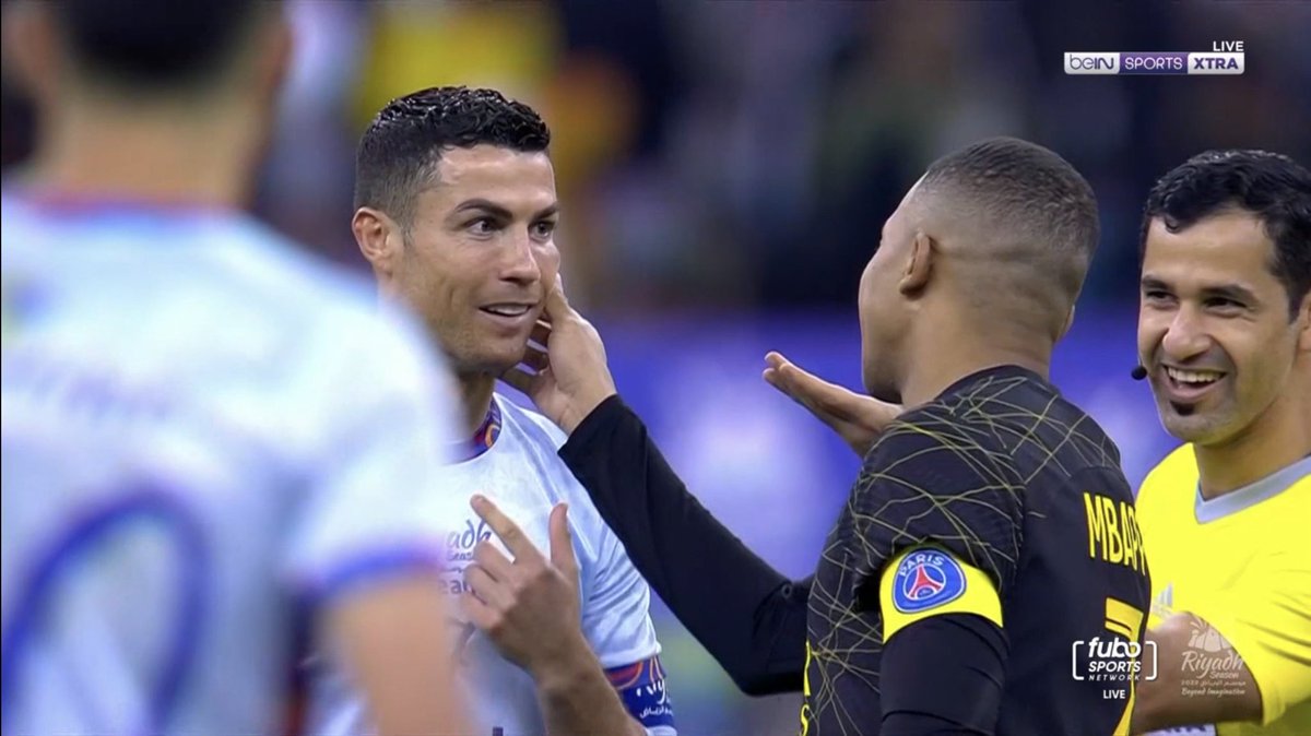 Footballtweet's tweet photo. Kylian Mbappé checking if Cristiano Ronaldo is human. 🥹❤️ https://t.co/BKgBAkiRGu