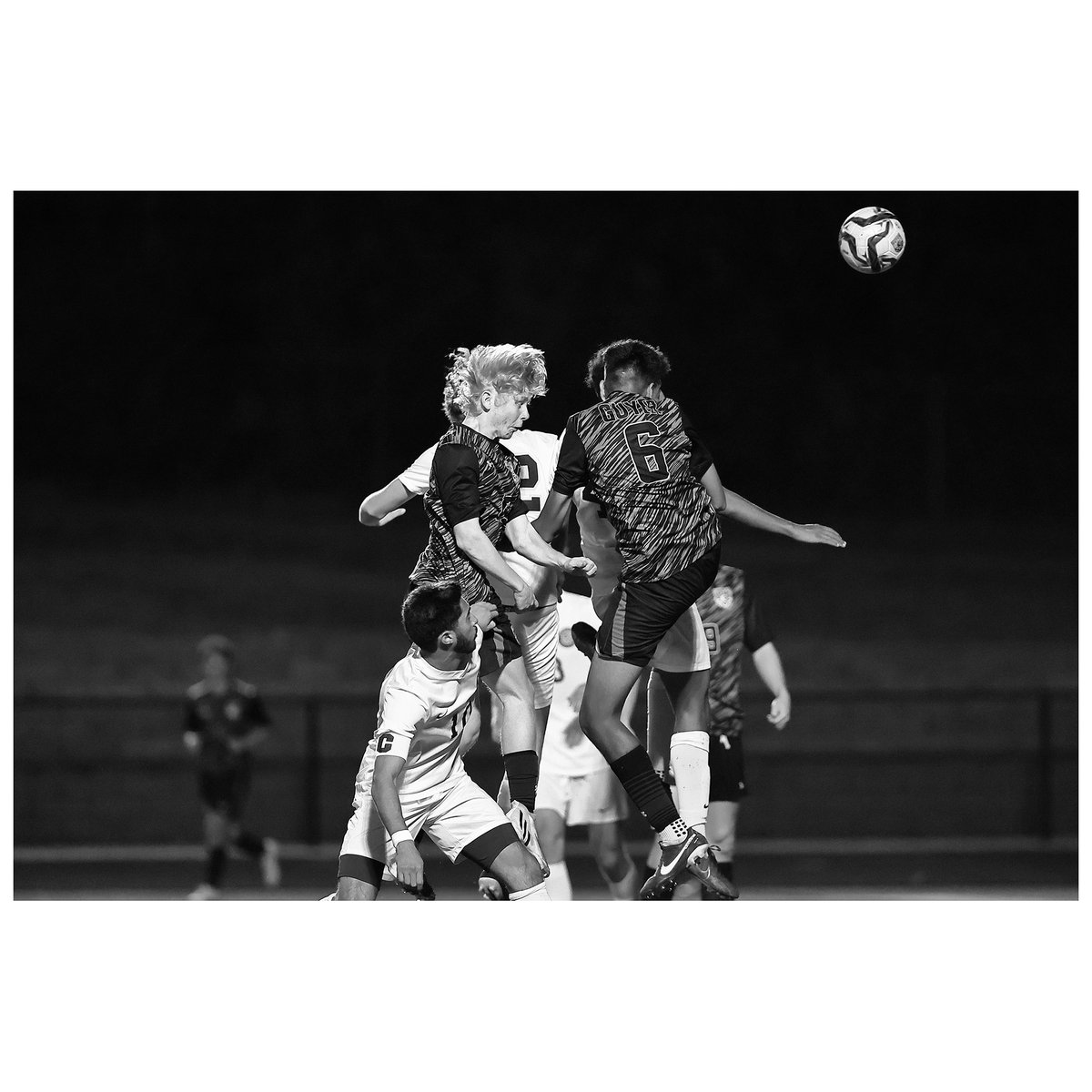 #wildcat13 &amp; #wildcat6 got some hang time on this header effort. 

#pixrguy #sportsphotography #soccer #wildcats #header #futbol #guyerhighschool #canonshooter #blackandwhite