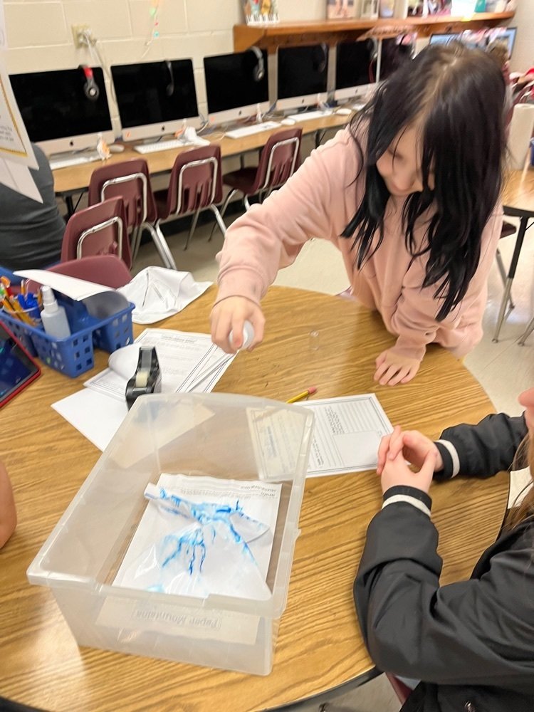PES_Lighthouse's tweet photo. Team work during STREAM work!!! Porter students are studying river formation by creating paper mountains. They mark the ridges and then make the rain fall down. Afterwards, they analyze which STREAMS they predict will turn into rivers. #Eagle4Life #JCSTREAM https://t.co/Qrpaemtcjv