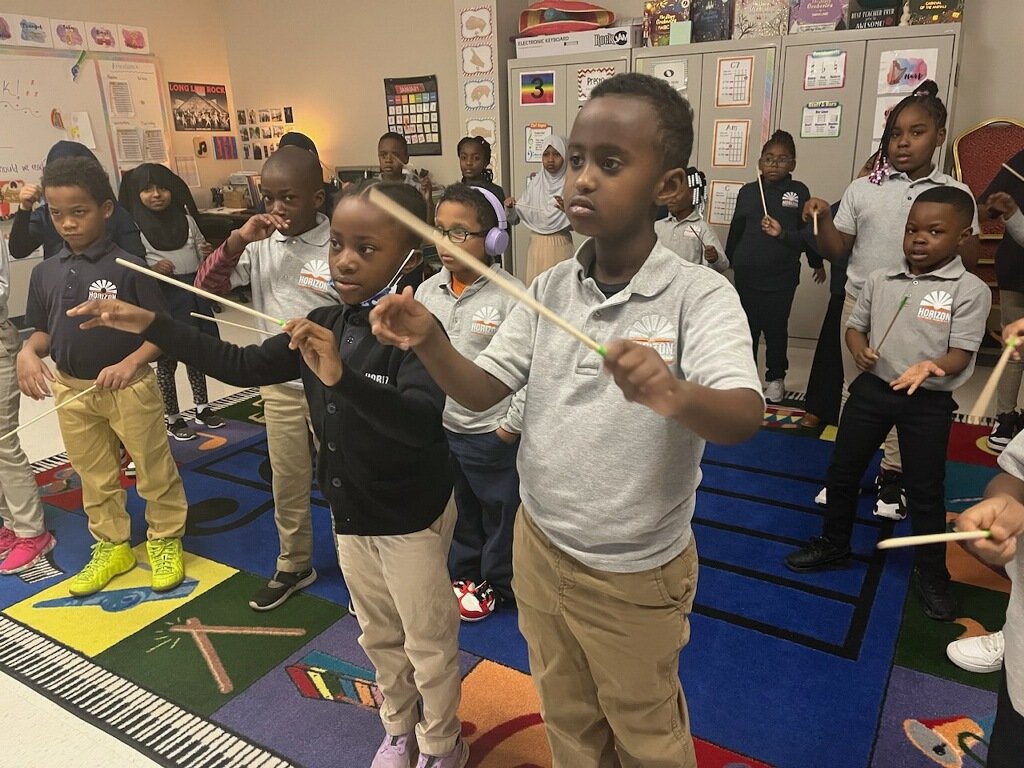 HSAColumbusPS's tweet photo. Second graders are learning about the important role a Conductor. So focused, So focused, we see some natural talent here! #HSAPrimary #MusicMatters #unifiedarts #WeAreConcept https://t.co/Y1O051r7Sy