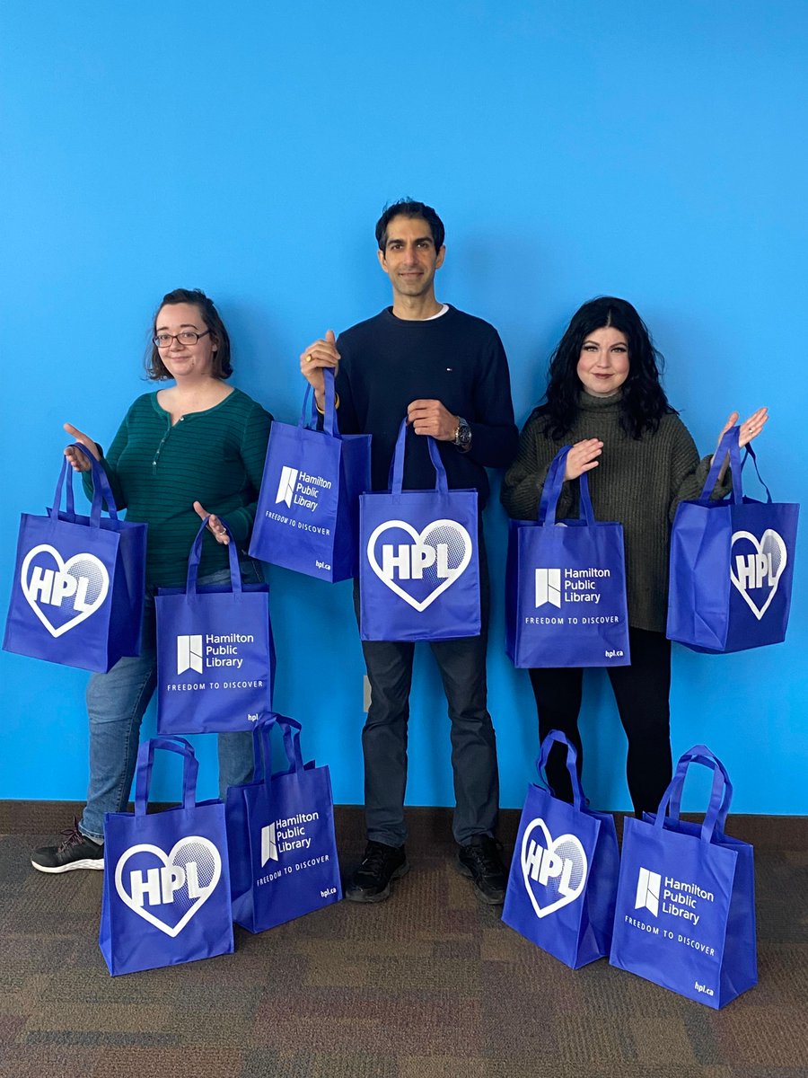 HamiltonLibrary's tweet image. New year, new look for HPL&apos;s handy tote bag. 
You may purchase the new bag at your local branch to bring that library haul home with you. #TeamHPL&apos;s Jessica, Aly and Callie are our tote-l HPL angels ready to fill their totes. hpl.ca/shop
#HamOnt #librarymerch