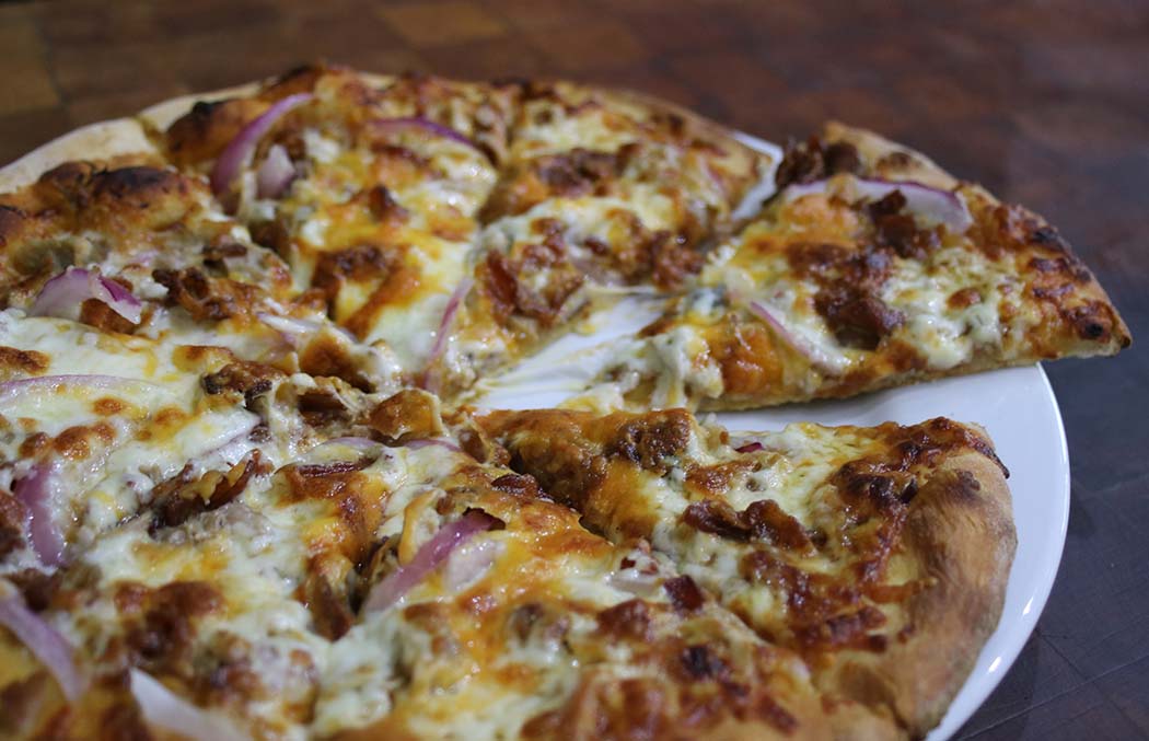 gtsonthebay's tweet photo. We feature three #specialtypizzas. We call this one the “Oinker.” Smoked pulled pork, crisp bacon, red onion, mozzarella and cheddar cheeses and red BBQ sauce. So good! #orangebeachrestaurants #orangebeachdining #beachdining #coastaldining https://t.co/51pbnJeJAf