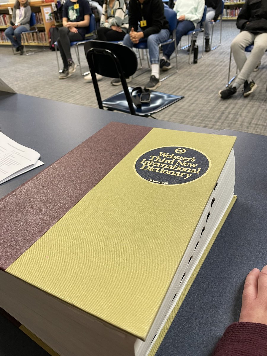 My very important annual job of manning the dictionary during the spelling bee! 😂