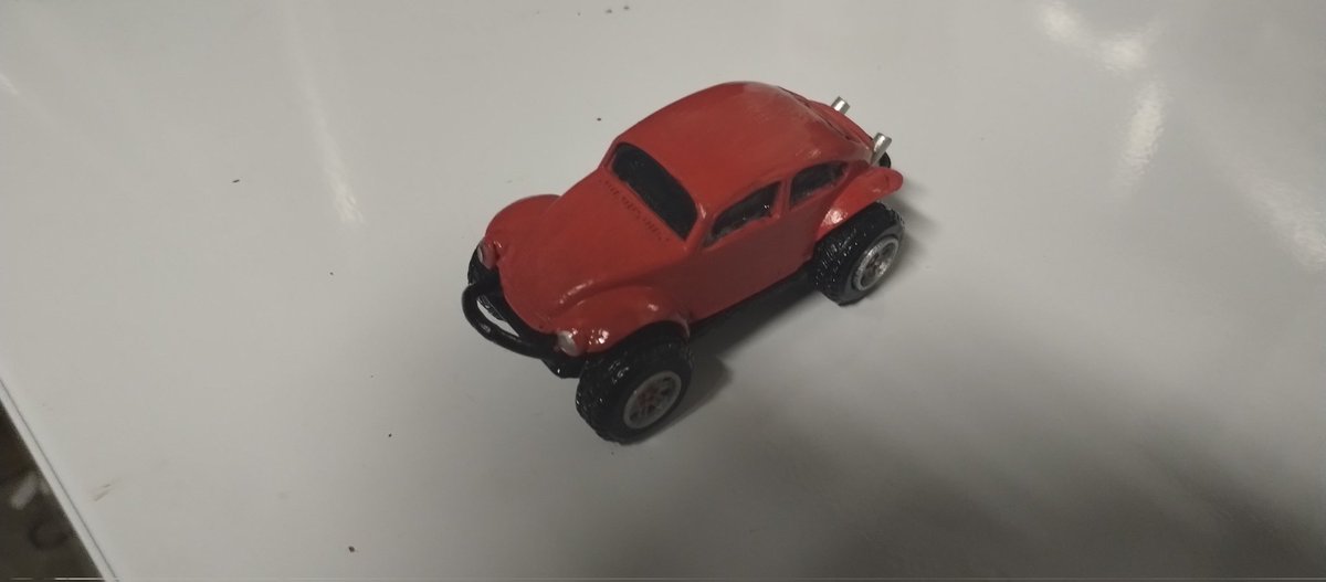 CyclingGuyNOLA's tweet photo. Wife asked me to 3D print her a VW for her desk (She works for VW). Resin printed on my @anycubic3dprint #MonoX, exhaust cut from a Capri Sun straw and push bumpers from qtips dipped in resin. https://t.co/hsbXNDzFK9
