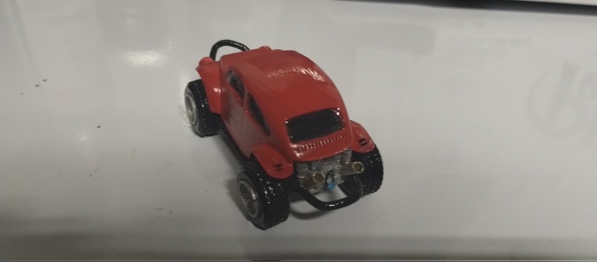 CyclingGuyNOLA's tweet photo. Wife asked me to 3D print her a VW for her desk (She works for VW). Resin printed on my @anycubic3dprint #MonoX, exhaust cut from a Capri Sun straw and push bumpers from qtips dipped in resin. https://t.co/hsbXNDzFK9