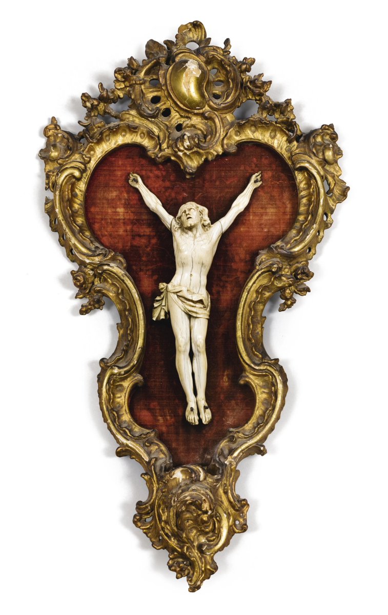 Utterly delighted by this 18th century ivory crucifixion in a giltwood frame shaped like a cock and balls. Perfect.