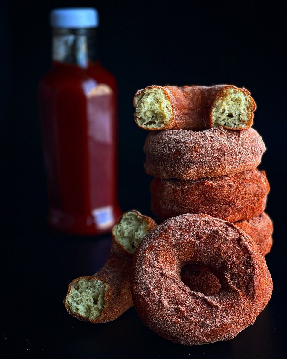 Potato week starts tomorrow! We’re participating w/ this ketchuped spudnut. It’s full of #Manitoba potatoes, flour,eggs &amp; butter &amp; it’s tossed in our house made ketchup seasoning. Find it at both shops Jan 20 - 29 while they last! <a href="/peakpotatoweek/">Potato Week</a> 
#Winnipeg #SupportLocal