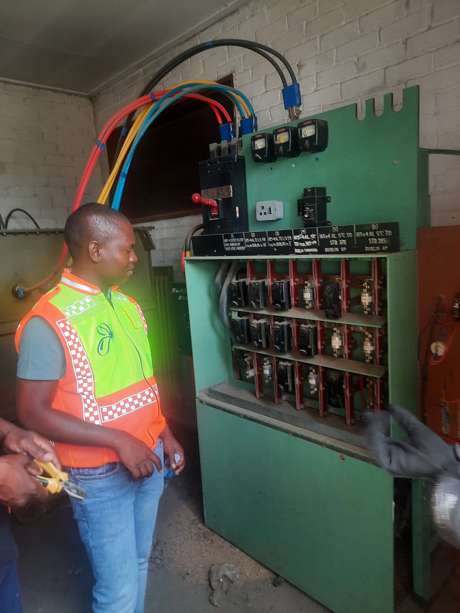 City Power technicians disconnecting defaultors in Alex.