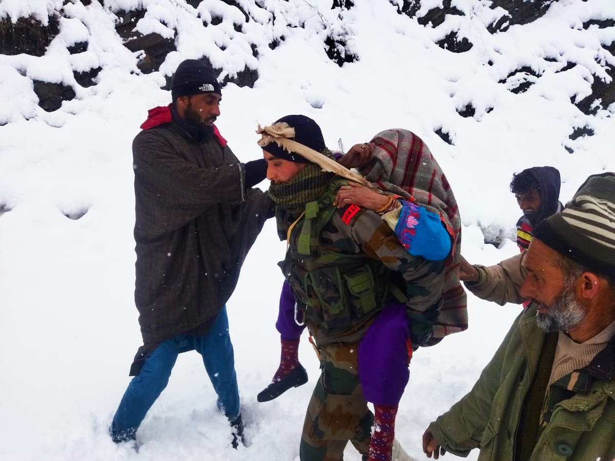 rohil_bashir's tweet photo. #in_pics
80 year old ailing women successfully evacuated by @ChinarcorpsIA jawans &amp; saved her precious life in heavy snowfall at Jabri village of North Kashmir’s #Baramulla district,the area is totally cutoff due to snowfall &amp; frozen roads @SudarshanNewsTV @adgpi @NorthernComd_IA https://t.co/TC2oPhHLn0