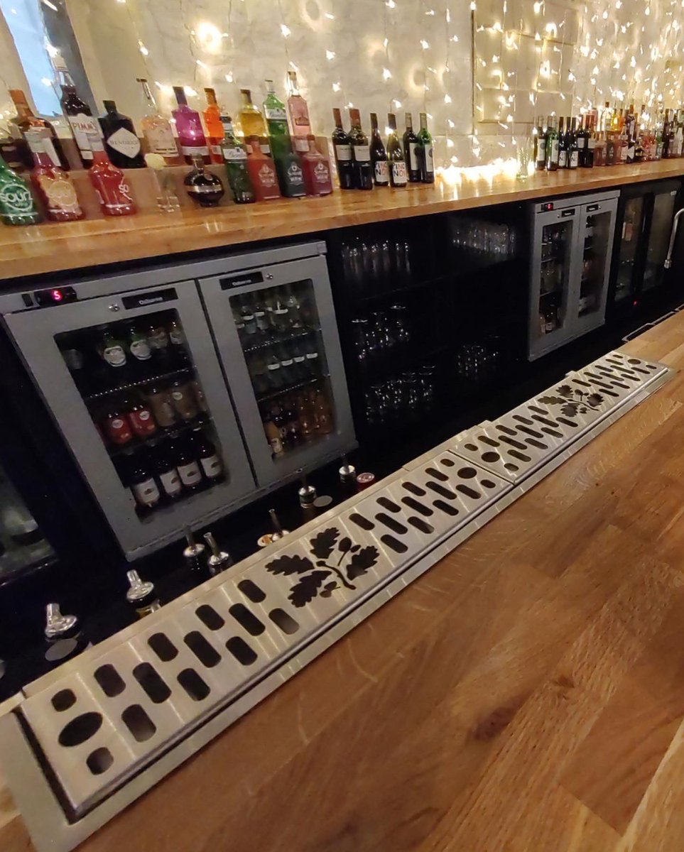 Our individually designed Drinks Dispense Trays, with the option of personalised branding, perfectly complement a Servaclean bar counter #bardesign #barcounter #cocktails #cocktailstation #mixology #outdoorbar #mobilebar #popupbar